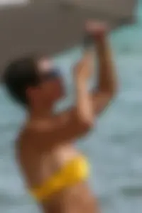 Frankie Bridge nip slips in a bikini on the beach