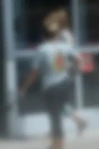 Girl going to TJ Maxx walking in the parking lot in leggings