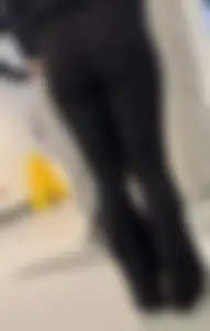 Cute College Girl With Flared Leggings And Glasses