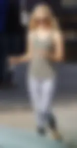 Hot blonde in light leggings after getting Starbucks