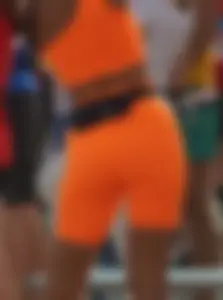 Athlete in Orange Spandex Outfit Stretching Legs VPL Candid Photos
