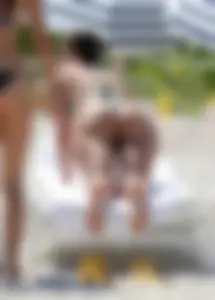 Chubby Candid Girl With A Hot Bubble Ass Bending Over a Sun-bed at a Beach Creepshots Gallery