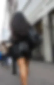 Hot brunette in genuine leather shorts & heels! Great ass!