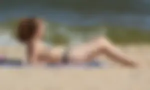 Two sexy beach teens in bikinis, one thick and one skinny with big boobs