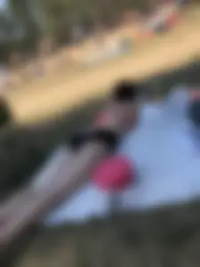 Pale Skinny Girl Lying on the Beach in Swimsuit With Crossed Legs Candid Gallery