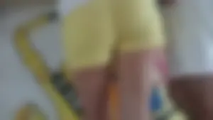Milf in yellow shorts with vpl and a wedgie