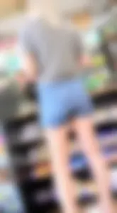 Tall pale blonde trying to hide that stellar ass