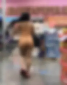 Latina with hard nipples and a big booty in tight spandex shorts outfit