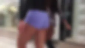 Sexy ass Asian babe at the mall in purple shorts with a sweet ass and cheeks