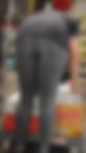 Slim clerk in tight grey jeans