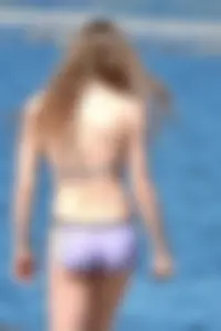 Beauty at the beach in booty short bikini