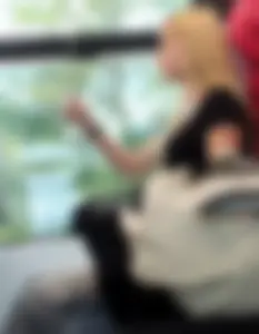 Hot busty blonde on train