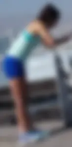 Athletic babe in blue spandex shorts with a nice ass