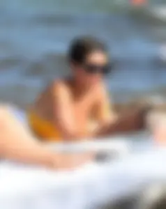 Frankie Bridge nip slips in a bikini on the beach