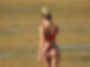 Hot ass beach blonde babe in little red thong