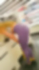 Tall and sexy blonde in purple leggings bending over with vtl