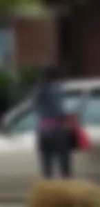 Ebony babe getting into her car with a great ass in grey leggings