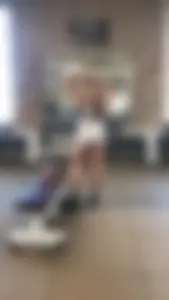 Hot blonde working out at the gym in shorts and crop top