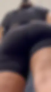 Girl Wearing Black Top And Tight Black Shorts (Upshots)