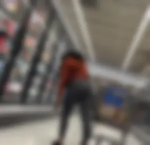 Ebony chick orange sweater + grey leggings
