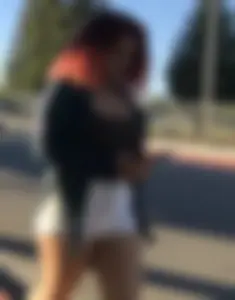 Big boobed redhead walking with no shoes and in shorts