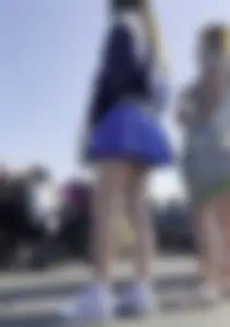 Teen wearing uniform skirt with awesome legs street creepshot