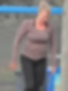 Beach volleyball blonde lady in tight leggings