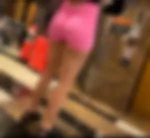 Latina with super tight pink shorts