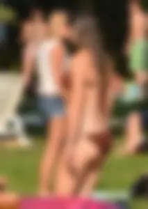 Various sexy girls in bikinis at the park
