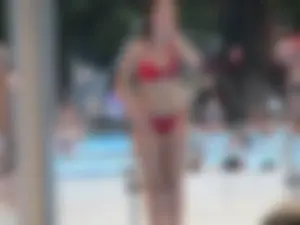 Hot girl with wide hips and nice gap in a red Spider Man thong bikini