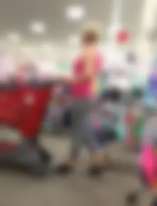 Blonde milf at Target in grey striped leggings with a nice ass
