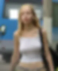 Braless blonde with nice tits