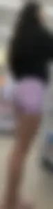 Lavender spandex shorts on a brunette thot with long black nails