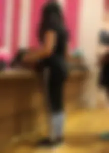 Mature sexy lady in Pink leggings shopping at Pink