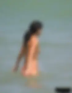 A bunch of sexy beach voyeur babes in bikinis, thongs and topless