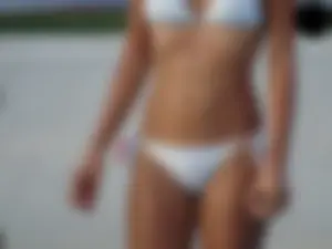 Sexy bikini babe in a white bikini at the pool with camel toe