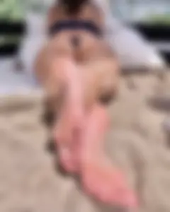 Unsuspecting girls lying on stomach