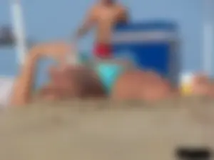 2 topless thonged sexy friends on the beach with great bodies