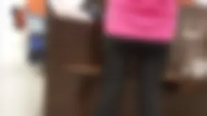 Nice ass in leggings standing in line shopping