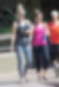 Skinny blonde in grey leggings with a friend