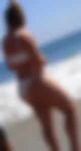 Big booty teen at the beach in a white bikini