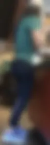 Latina in Nike leggings at the wing shop