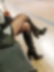 Absolutely gorgeous pair of crossed legs in black pantyhose and knee high boots on high heels creepshot
