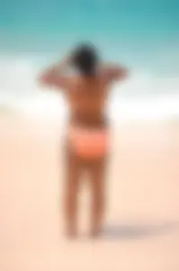 Assortment of sexy babes at the beach in bikinis