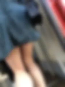 Cute candid girl in a dress at the train station