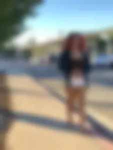 Big boobed redhead walking with no shoes and in shorts