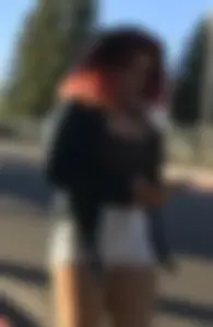 Big boobed redhead walking with no shoes and in shorts