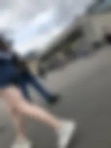 Candid Girl in Blue Denim Shorts and Sneakers Walking Down the Street - Hot Legs Crepshots Collection