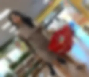 Brown Babe in a Hot Dress that Shows Her Nipples