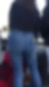 Teen in jeans pants bend over